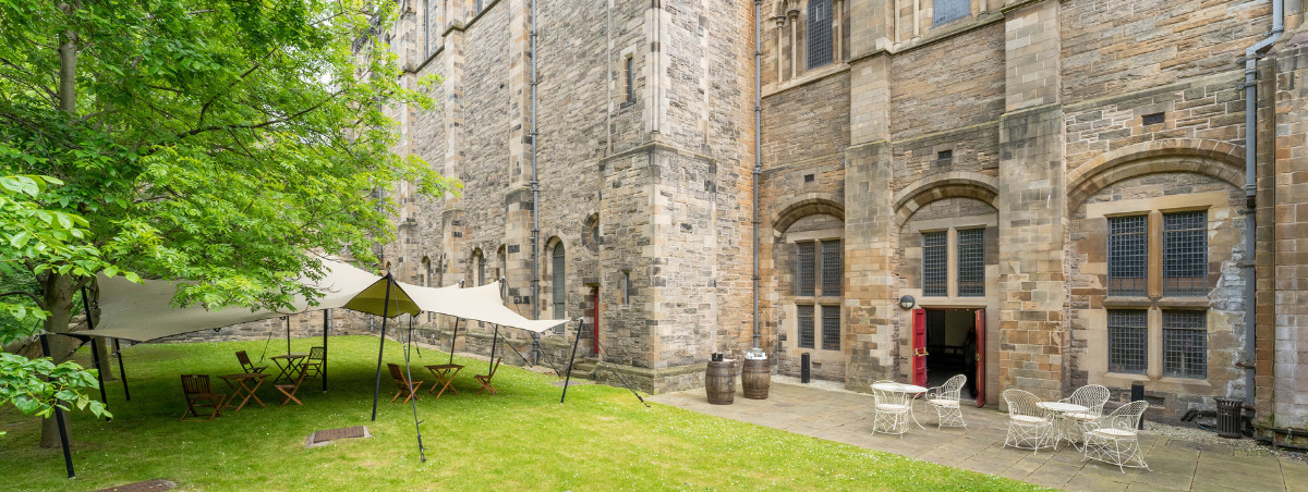 Outdoor garden space at Mansfield Traquair - Beating Retreat by a pipe band