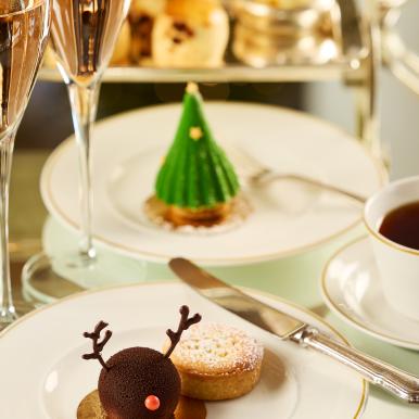 A Christmas tree and reindeer dessert at an afternoon tea
